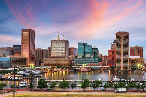 Baltimore, Maryland, USA Skyline on the Inner Harbor at dusk.