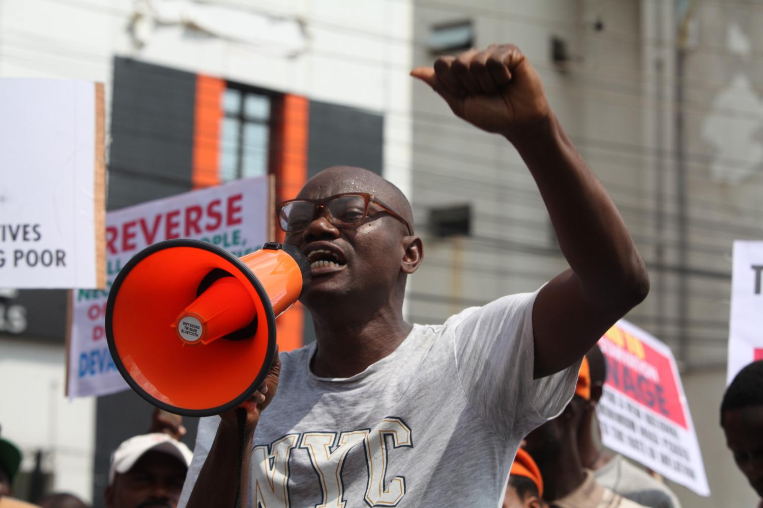 Members of civil society groups hold a peaceful protest over economic hardship and unfriendly government policies to mark Nigeria Democracy Day in Ikeja, Lagos, Nigeria, on June 12, 2024. (Photo by Adekunle Ajayi)