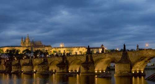 A view of Prague's medieval Charles Bridge with Prague Castle in the background on July 9, 2007.