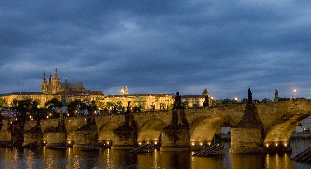 A view of Prague's medieval Charles Bridge with Prague Castle in the background on July 9, 2007.
