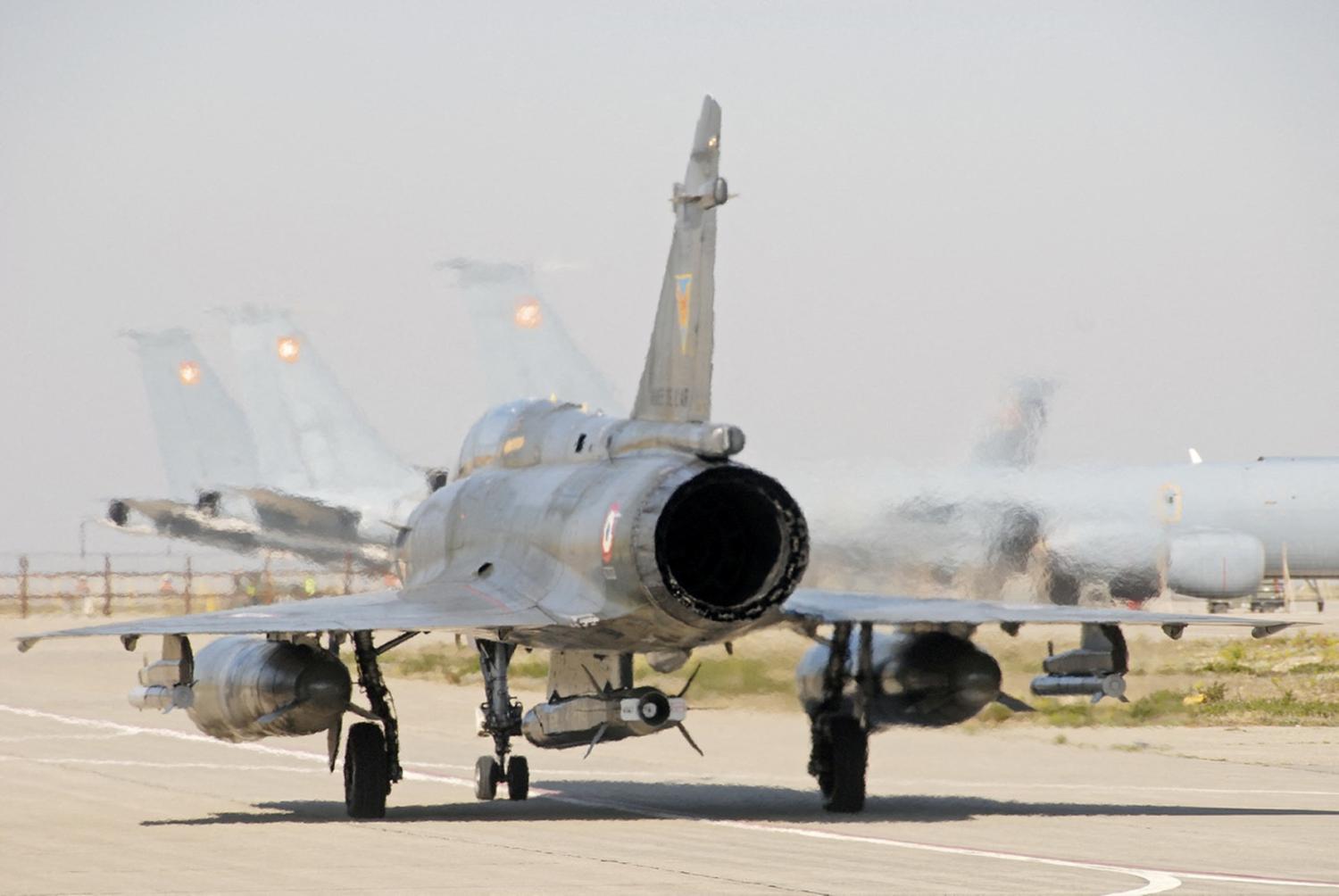 Handout photo shows a Dassault Super Etendard jet fighter carrying a ASMPA (medium-range air to surface missile) French nuclear air-launched cruise missile, taking off from Istres air base, south of France.