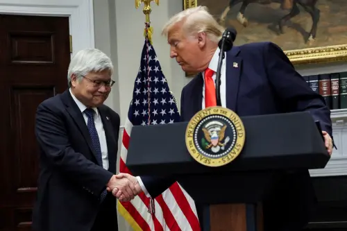 U.S. President Donald Trump shakes hands with C.C. Wei, chairman and CEO of TSMC, as they make an announcement about an investment from Taiwan Semiconductor Manufacturing Company (TSMC), in the Roosevelt Room at the White House in Washington, DC, U.S., March 3, 2025.