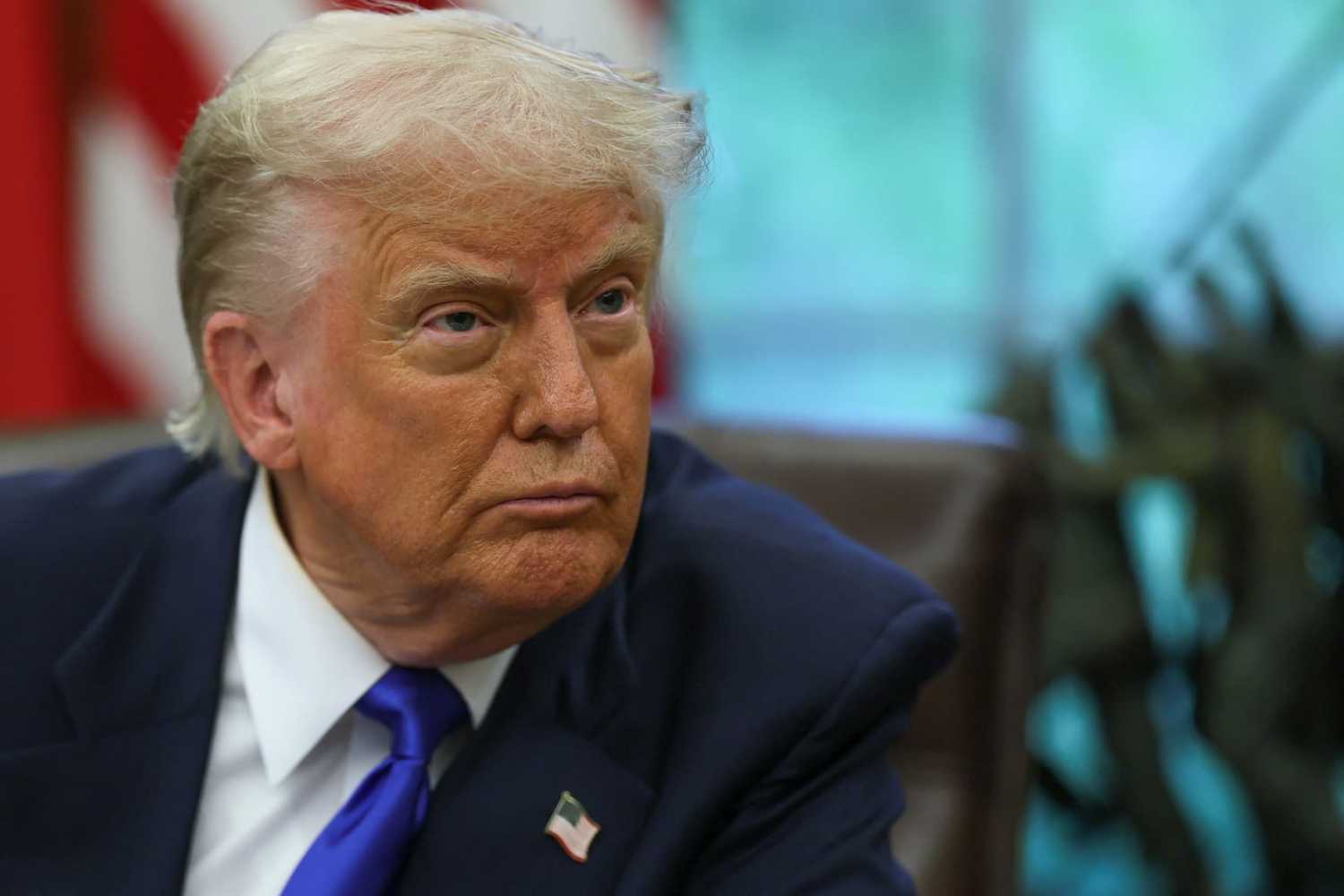 U.S. President Donald Trump looks on as he signs executive orders and proclamations in the Oval Office at the White House, in Washington, D.C., U.S., on May 5, 2025. REUTERS/Leah Millis