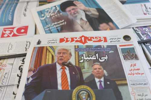 An Iranian newspaper with a cover photo of U.S. President Donald Trump and U.S. Middle East envoy Steve Witkoff, is seen in Tehran May 11, 2025.