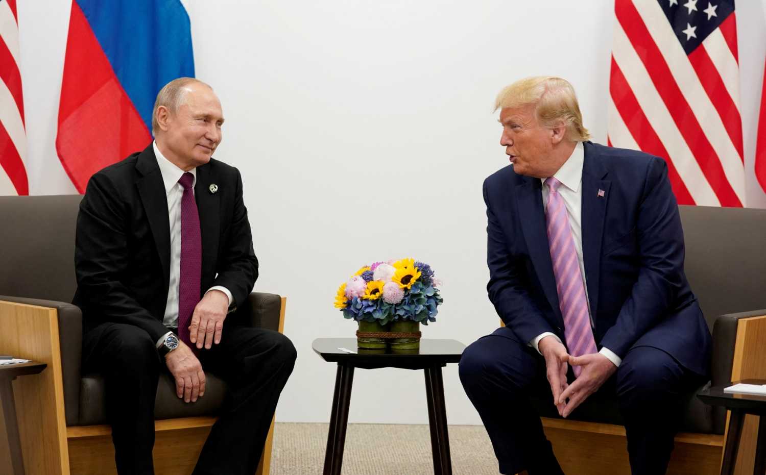 Russia's President Vladimir Putin and U.S. President Donald Trump talk during a bilateral meeting at the G20 leaders summit in Osaka, Japan, June 28, 2019.
