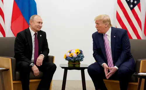 Russia's President Vladimir Putin and U.S. President Donald Trump talk during a bilateral meeting at the G20 leaders summit in Osaka, Japan, June 28, 2019.