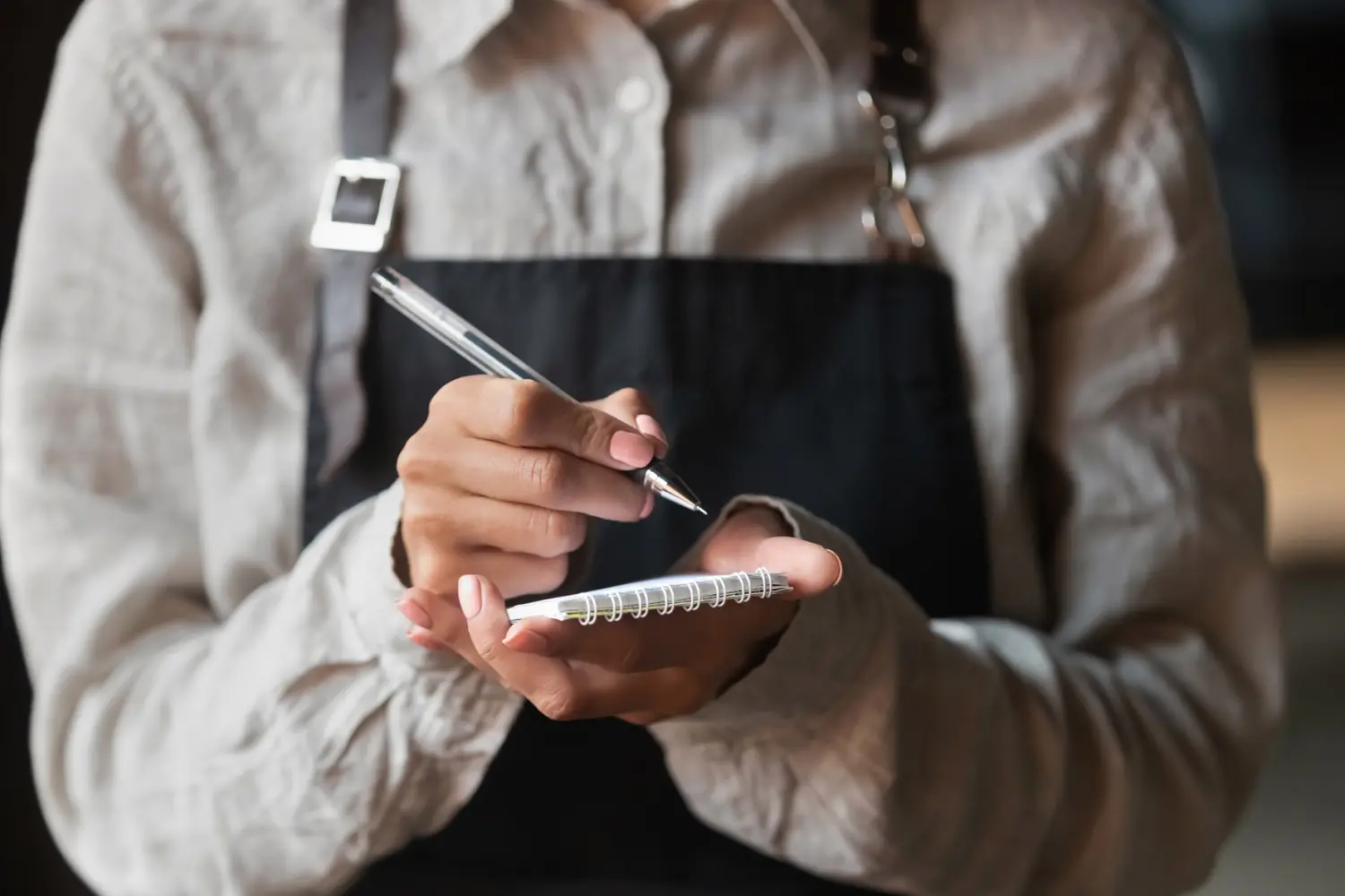 Service worker holds notepad