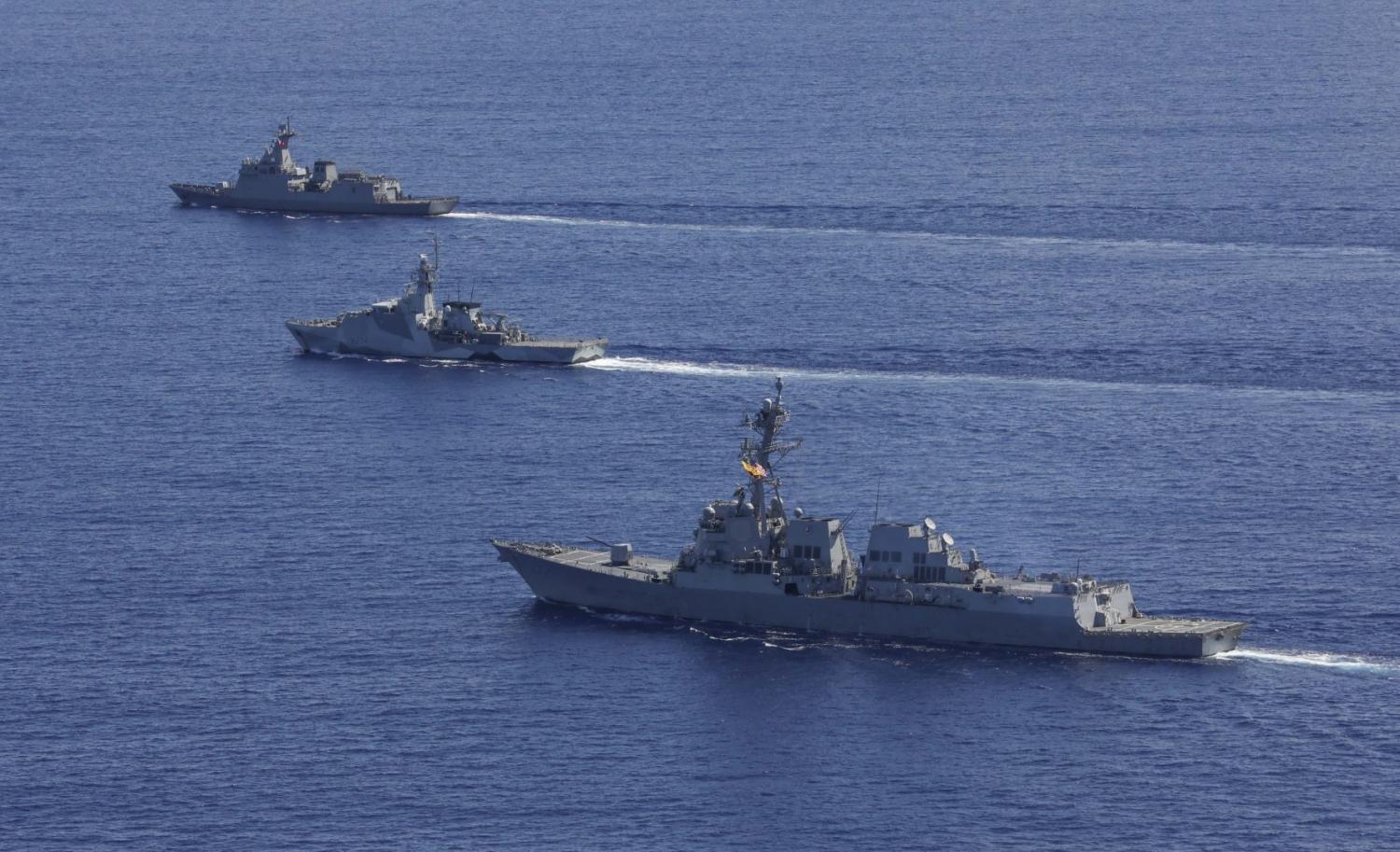 The Arleigh Burke-class guided-missile destroyer USS Dewey (DDG 105), near, Royal Navy offshore patrol vessel HMS Spey (P 234), center, and Philippine Navy guided-missile frigate BRP Antonio Luna (FF 151) steam in formation while participating in a photo exercise in the Philippine Sea as part of Maritime Training Activity Sama Sama, Oct. 8, 2023.