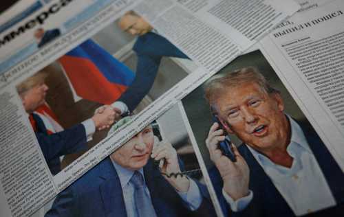 Daily newspapers with covers, dedicated to the recent phone call of Russian President Vladimir Putin and U.S. President Donald Trump, are laid out at a newsstand in a street in Moscow, Russia, February 13, 2025.