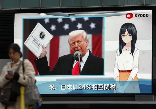A street monitor in Tokyo's Akihabara area shows on April 3, 2025 news that U.S. President Donald Trump announced reciprocal tariffs on all countries overnight, including one of 24% on Japanese imports. Reuters/Kyodo