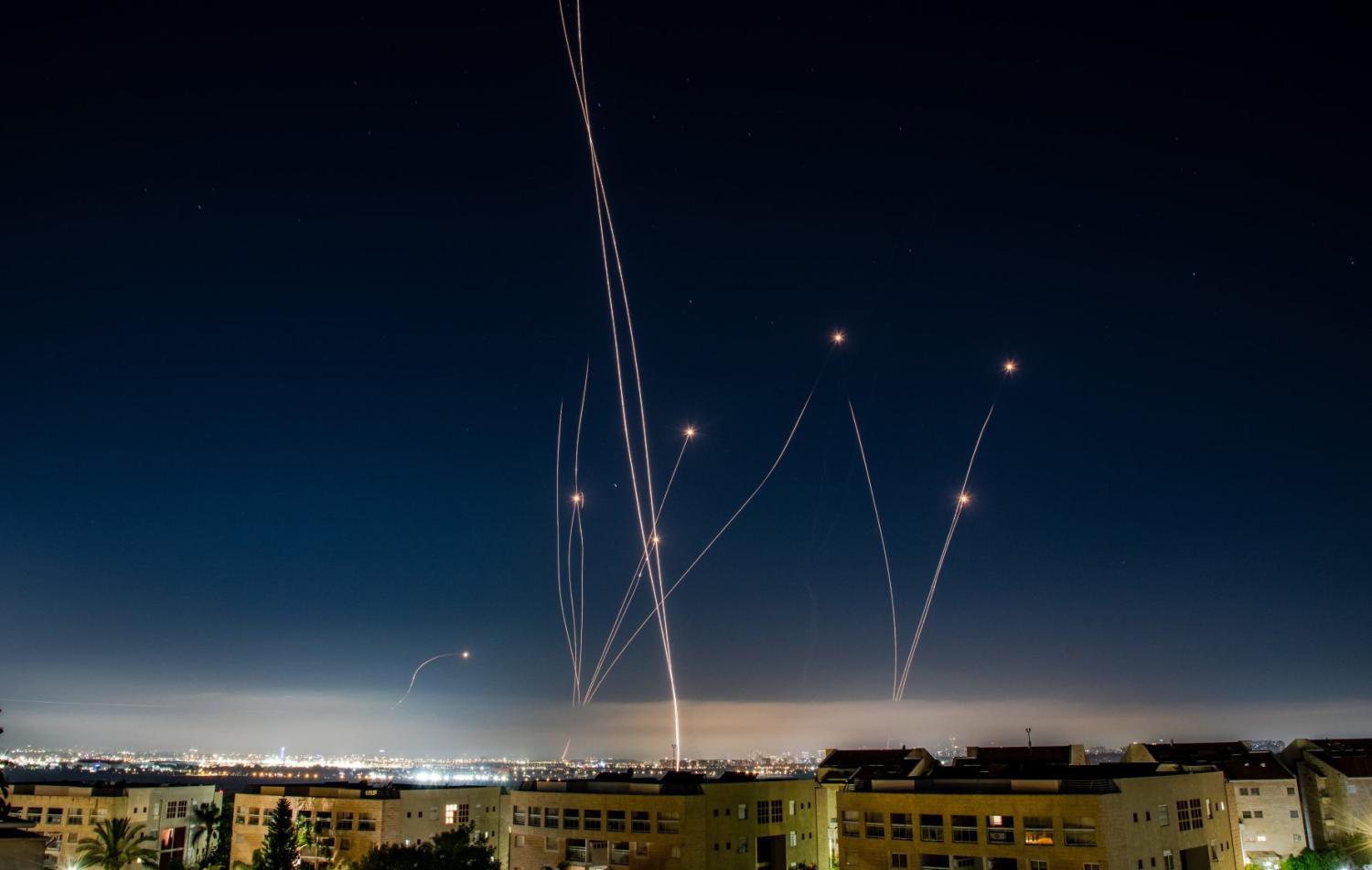 An Israeli Air defense system intercepts a ballistic missile barrage launched from Iran to central Israel during the missile attack.