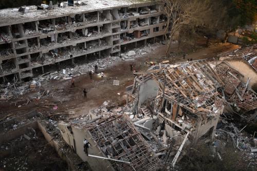 Rescue teams inspect the damage to buildings struck by an Iranian ballistic missile in Tel-Aviv, Israel, on June 22, 2025.