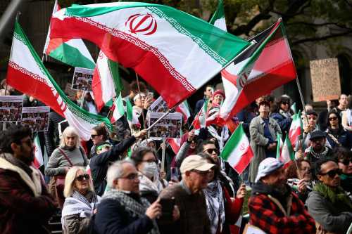 People gather at the Hands Off Iran rally at the State Library of Victoria in Melbourne, Sunday, June 22, 2025.