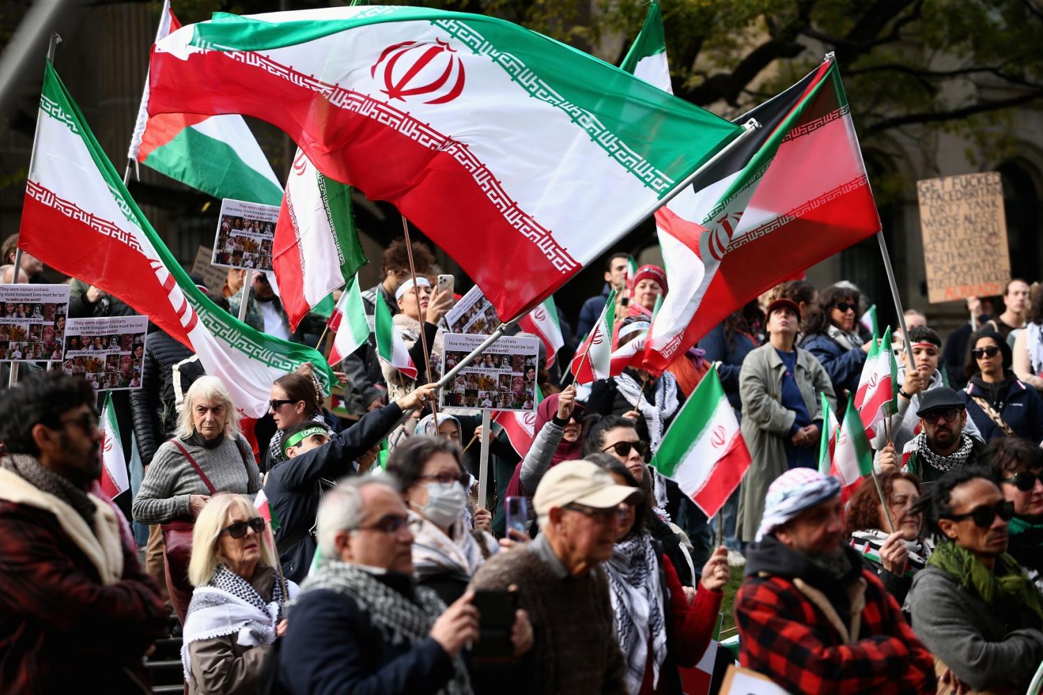 People gather at the Hands Off Iran rally at the State Library of Victoria in Melbourne, Sunday, June 22, 2025.