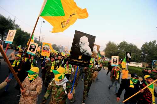 Kataib Hezbollah Iraqi militia gather ahead of the funeral of the Iraqi militia commander Abu Mahdi al-Muhandis, who was killed in an air strike at Baghdad airport, in Baghdad, Iraq, January 4, 2020.