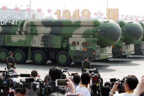 Military vehicles carrying DF-41 intercontinental ballistic missiles travel past Tiananmen Square during the military parade marking the 70th founding anniversary of People's Republic of China, on its National Day in Beijing, China, October 1, 2019.