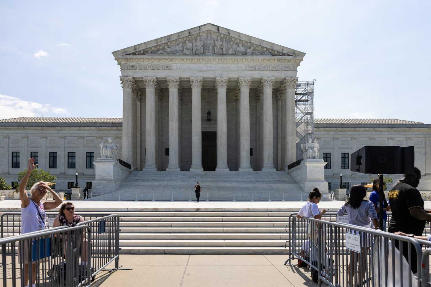 Demonstrators gather outside the U.S. Supreme Court as justices issue rulings in the cases of Fischer v. United States, Loper Bright Enterprises v. Raimondo, and City of Grants Pass v. Johnson, in Washington, U.S., on June 28, 2024.