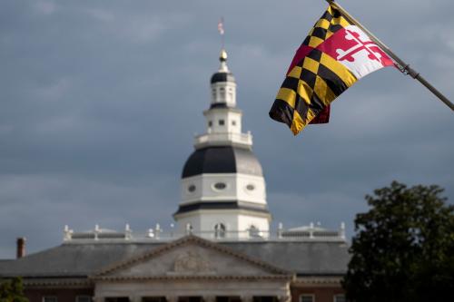 A general view of the Maryland flag and Maryland State House, in Annapolis, Maryland, on Friday, October 4, 2024.