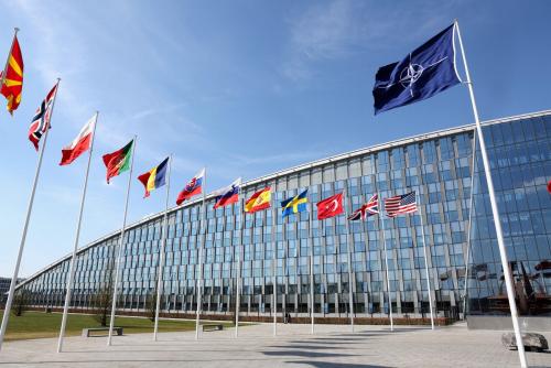 National flags of NATO members flutter at the alliance's headquarters in Brussels, Belgium, April 2, 2025.