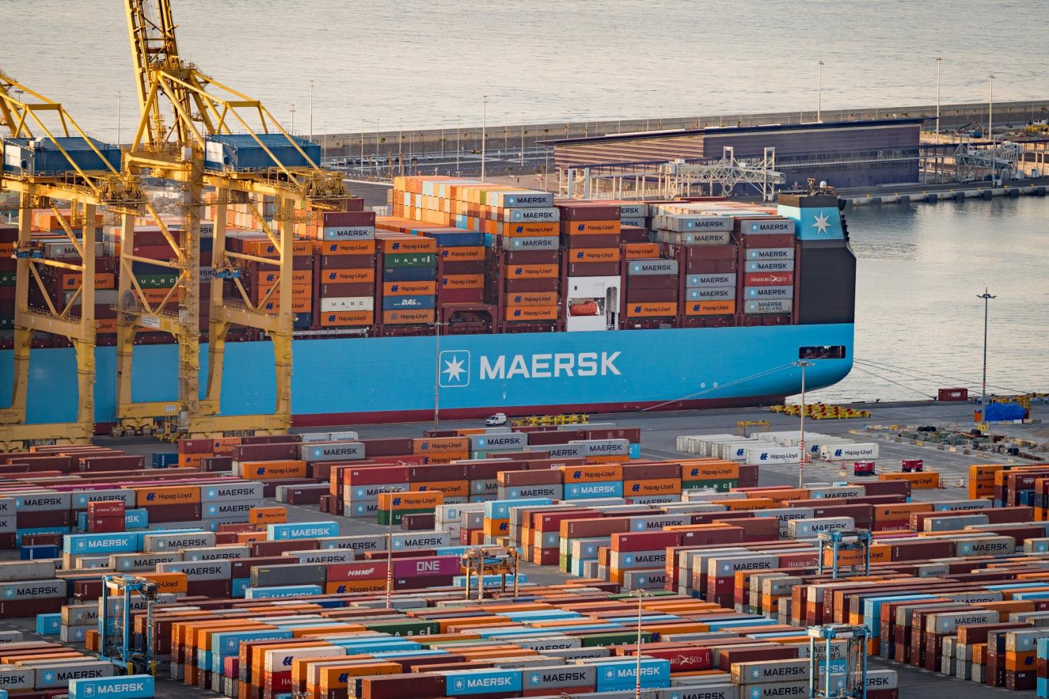 Shipping containers and cargo ships seen in the port of Barcelona, Spain.