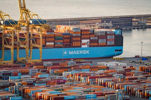 Shipping containers and cargo ships seen in the port of Barcelona, Spain.
