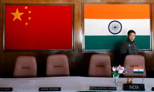A man walks inside a conference room used for meetings between military commanders of China and India, at the Indian side of the Indo-China border at Bumla, in the northeastern Indian state of Arunachal Pradesh, November 11, 2009.