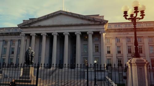 United States Department of the Treasury Building with the statue of Alexander Hamilton in Washington, DC,