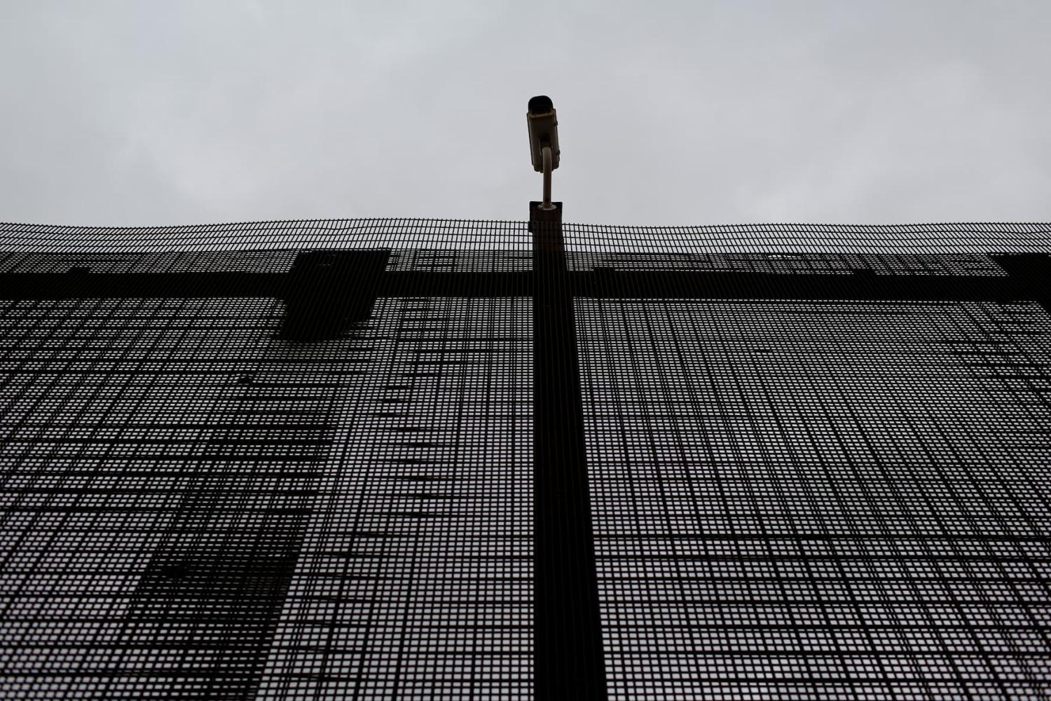 A surveillance camera is pictured atop the border fence separating the United States and Mexico in El Paso, U.S. January 17, 2017.
