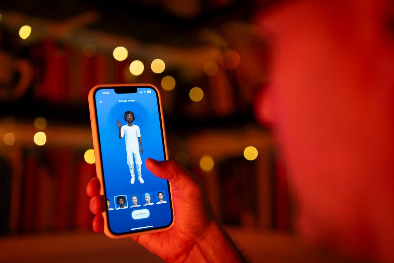 A user interacting with a smartphone app to customize an avatar for a personal artificial intelligence chatbot, known as a Replika.