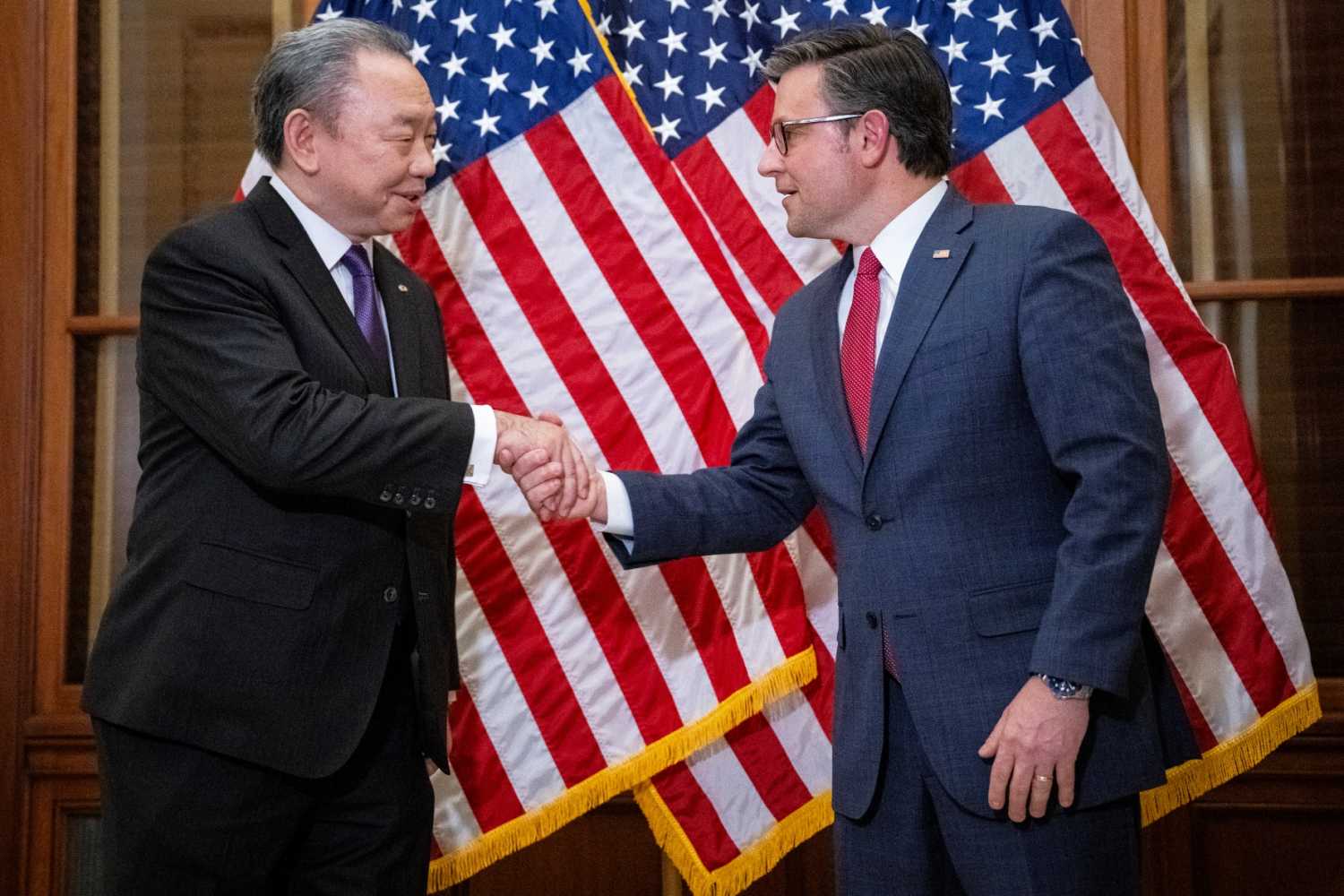 Speaker of the House Mike Johnson (R-LA) greets Ambassador of Taiwan Alexander Yui during a photo-op before a meeting, at the U.S. Capitol, in Washington, D.C., on Tuesday, January 9, 2024.