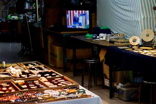 News about U.S. President Donald Trump unveiling sweeping new tariffs on trading partners runs on television at a jade shop in Taipei, Taiwan April 3, 2025.