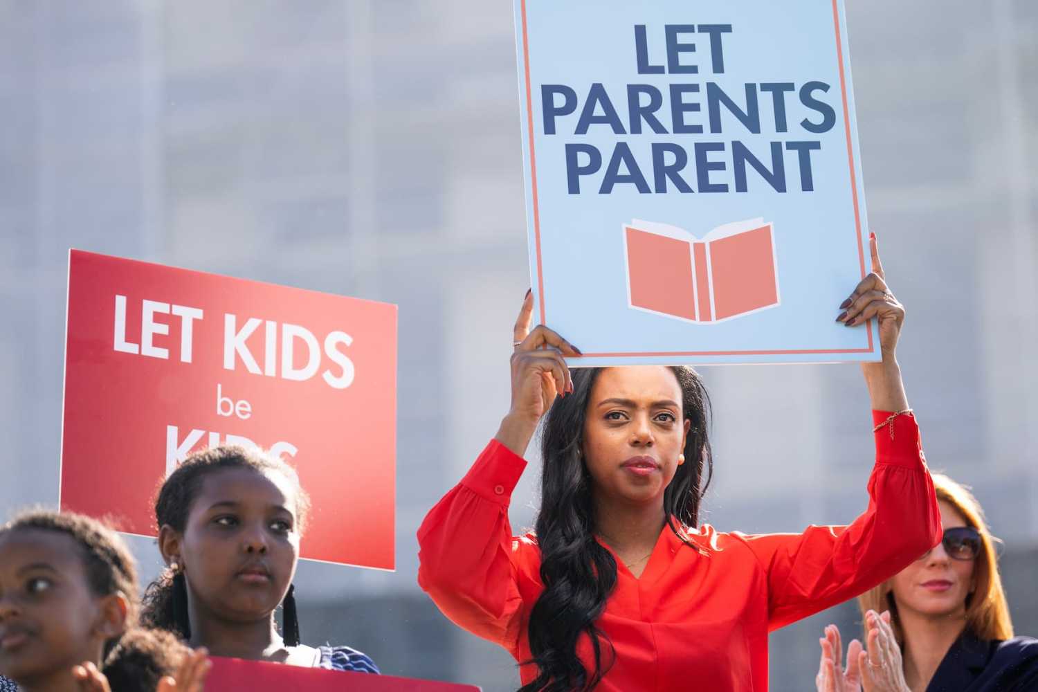 Demonstrators are seen outside the Supreme Court as oral arguments were heard on Mahmoud v. Taylor on Tuesday, April 22, 2025. The case contends that forcing students to participate in LGBTQ+ learning material violates First Amendment rights to exercise religious beliefs.
