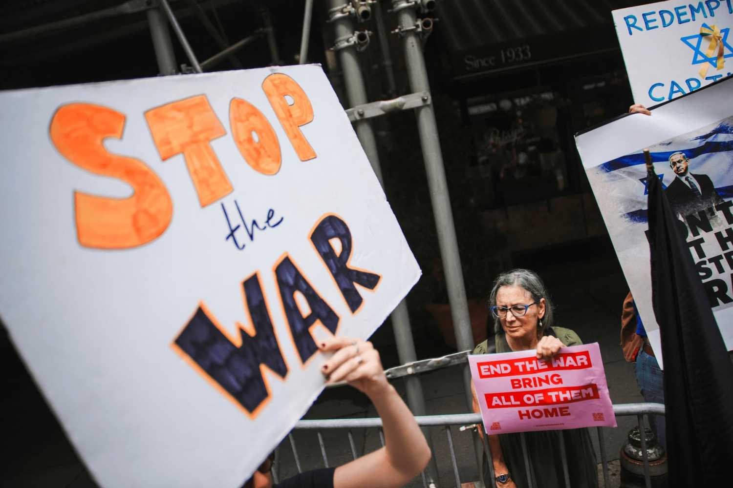People take part in a protest against the Israeli government, demanding the release of all hostages, amid the ongoing conflict in Gaza between Israel and Hamas, outside the Israeli consulate in New York City, U.S. July 7, 2025. REUTERS/Eduardo Munoz