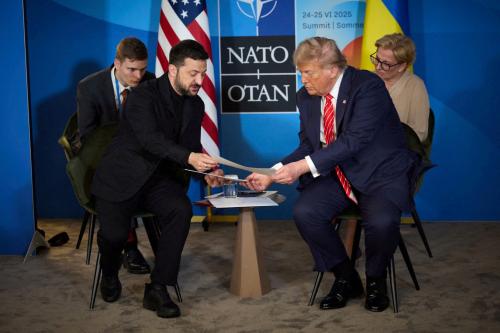 FILE PHOTO: U.S. President Donald Trump and Ukraine's President Volodymyr Zelenskiy attend a meeting on the sidelines of NATO summit in The Hague, Netherlands June 25, 2025. Ukrainian Presidential Press Service/Handout via REUTERS