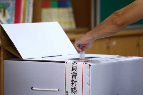 A voter casts a ballot in a recall election, at a polling station in Taipei, Taiwan July 26, 2025.