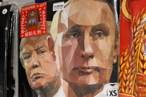 T-shirts with images of Russian President Vladimir Putin and U.S. President Donald Trump are displayed for sale at a gift shop in central Moscow, Russia, August 12, 2025.