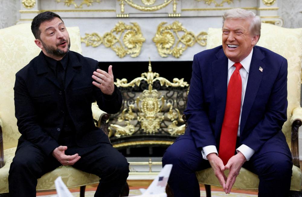 FILE PHOTO: Ukrainian President Volodymyr Zelenskiy gestures during a meeting with U.S. President Donald Trump at the Oval Office of the White House, amid negotiations to end the Russian war in Ukraine, in Washington, D.C., U.S., August 18, 2025.