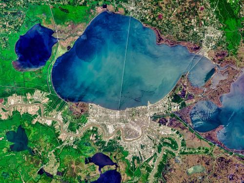 Aerial of New Orleans, Louisiana. Green land, city space, and vibrant blue water. Elements of this image furnished by NASA.