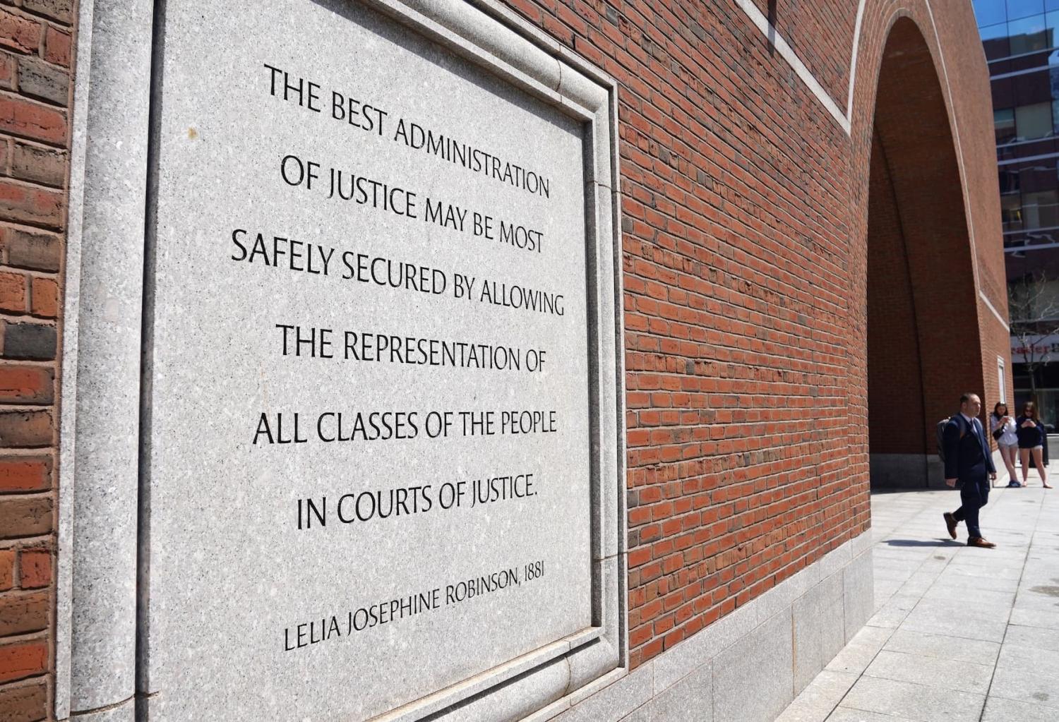 A man leaves the federal courthouse where a group of Democratic state attorneys are asking a federal judge to block U.S. President Donald Trump's administration from dismantling the U.S. Department of Education and halt it from laying off nearly half of its staff, in Boston, Massachusetts, U.S., April 25, 2025. REUTERS/Amanda Sabga