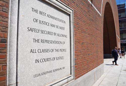 A man leaves the federal courthouse where a group of Democratic state attorneys are asking a federal judge to block U.S. President Donald Trump's administration from dismantling the U.S. Department of Education and halt it from laying off nearly half of its staff, in Boston, Massachusetts, U.S., April 25, 2025. REUTERS/Amanda Sabga