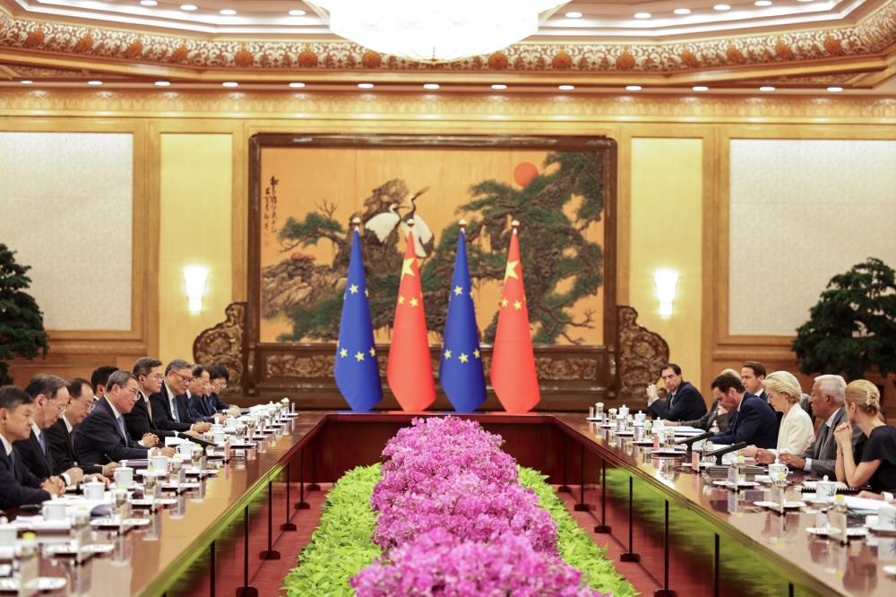 Chinese Premier Li Qiang listens as President of the European Council, Antonio Costa, speaks in presence of President of the European Commission, Ursula von der Leyen, and High Representative for Foreign Affairs and Security Policy and Vice-President of the European Commission Kaja Kallas, during the opening remarks of their meeting at the 25th European Union - China Summit at the Great Hall of the People in Beijing, China, 24 July 2025.