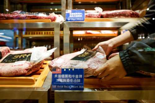 A staff member organizes U.S. imported beef at a supermarket, as the U.S. prepares to announce trade tariffs on Taiwan, in Taipei, Taiwan, July 31, 2025.
