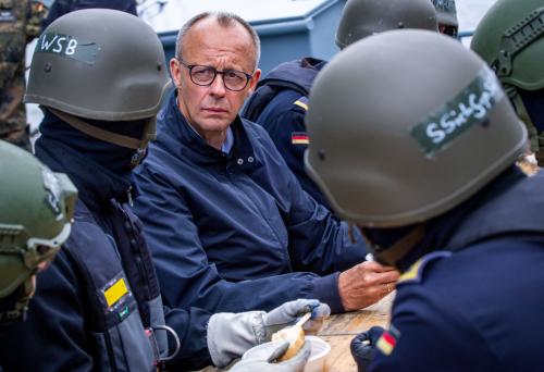 Federal Chancellor Friedrich Merz (CDU) talks to soldiers during his visit to the submarine hunting frigate "Bayern" on a training cruise in the Baltic Sea.