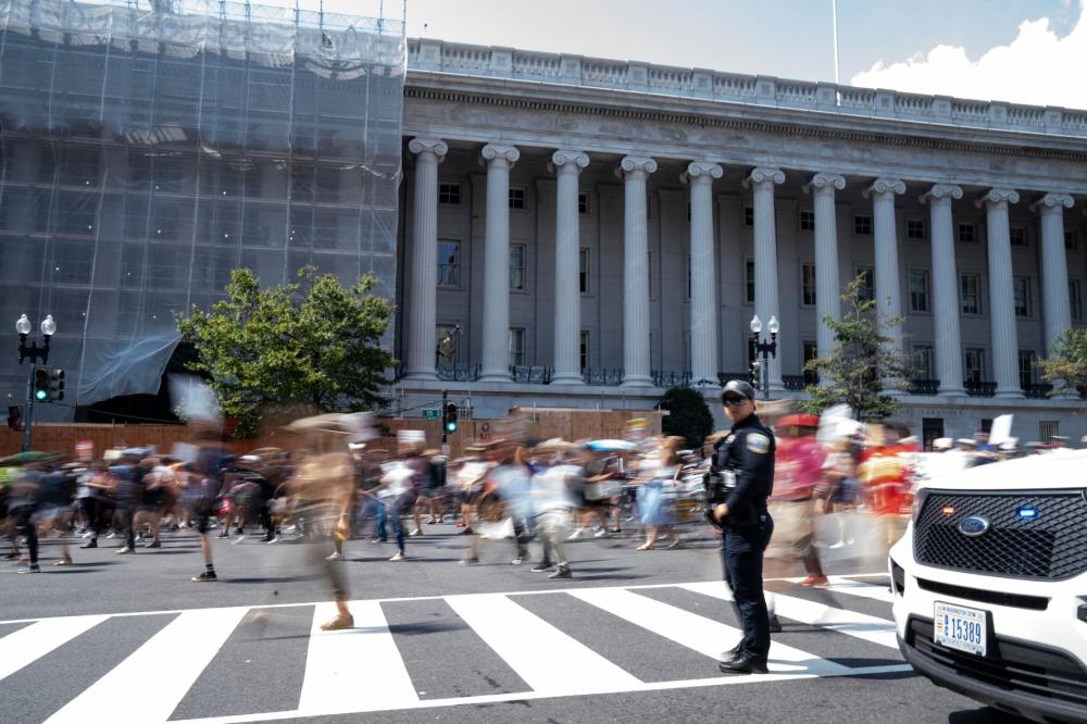 Seven groups of different organizations gather at Meridian Hill Park and march by the White House, then to Freedom Plaza in Washington, DC, on Sept. 6, 2025.