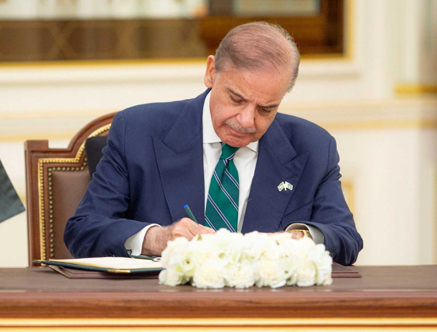 Pakistan Prime Minister Shehbaz Sharif signs a defence agreement next to Saudi Crown Prince Mohammed bin Salman (not pictured) in Riyadh, Saudi Arabia, September 17, 2025.