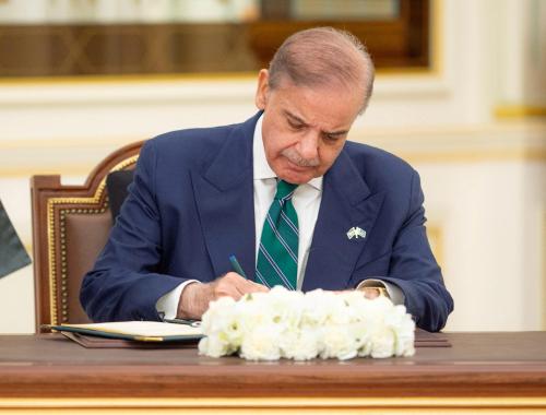 Pakistan Prime Minister Shehbaz Sharif signs a defence agreement next to Saudi Crown Prince Mohammed bin Salman (not pictured) in Riyadh, Saudi Arabia, September 17, 2025.