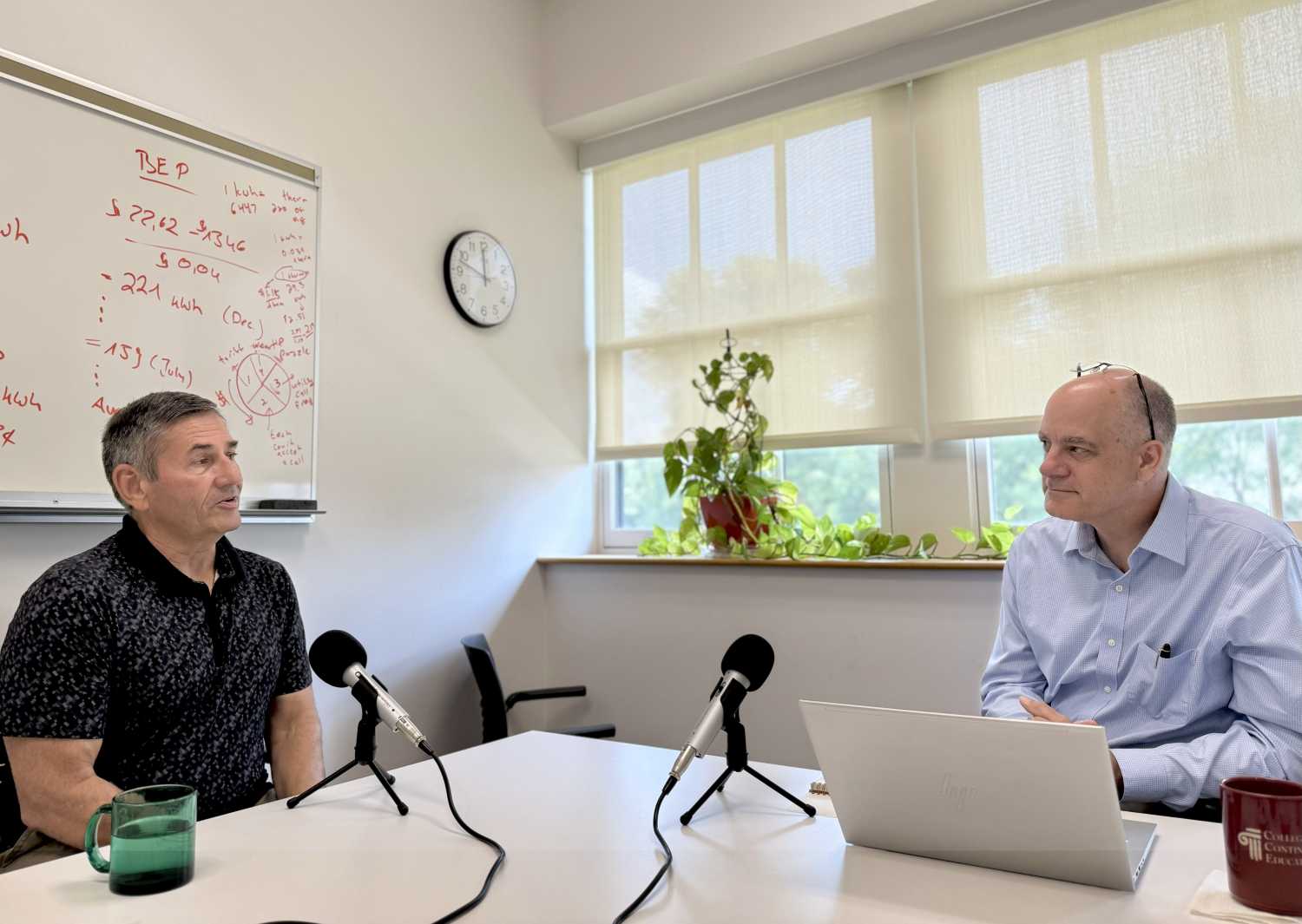 Blaine Hill (l), retired Morris city manager, is interviewed by Tony Pipa.
