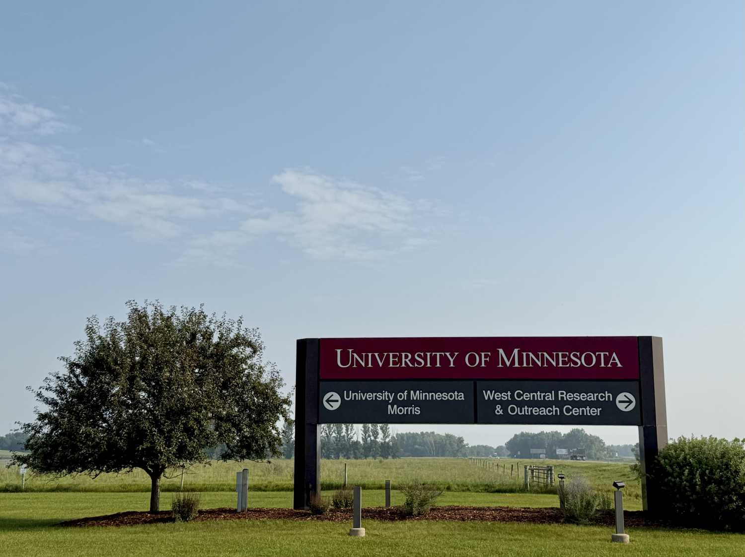 University of Minnesota signage showing direction to the Morris campus and to the West Central Research & Outreach Center.