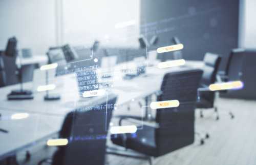 An empty office with computer code superimposed on top.