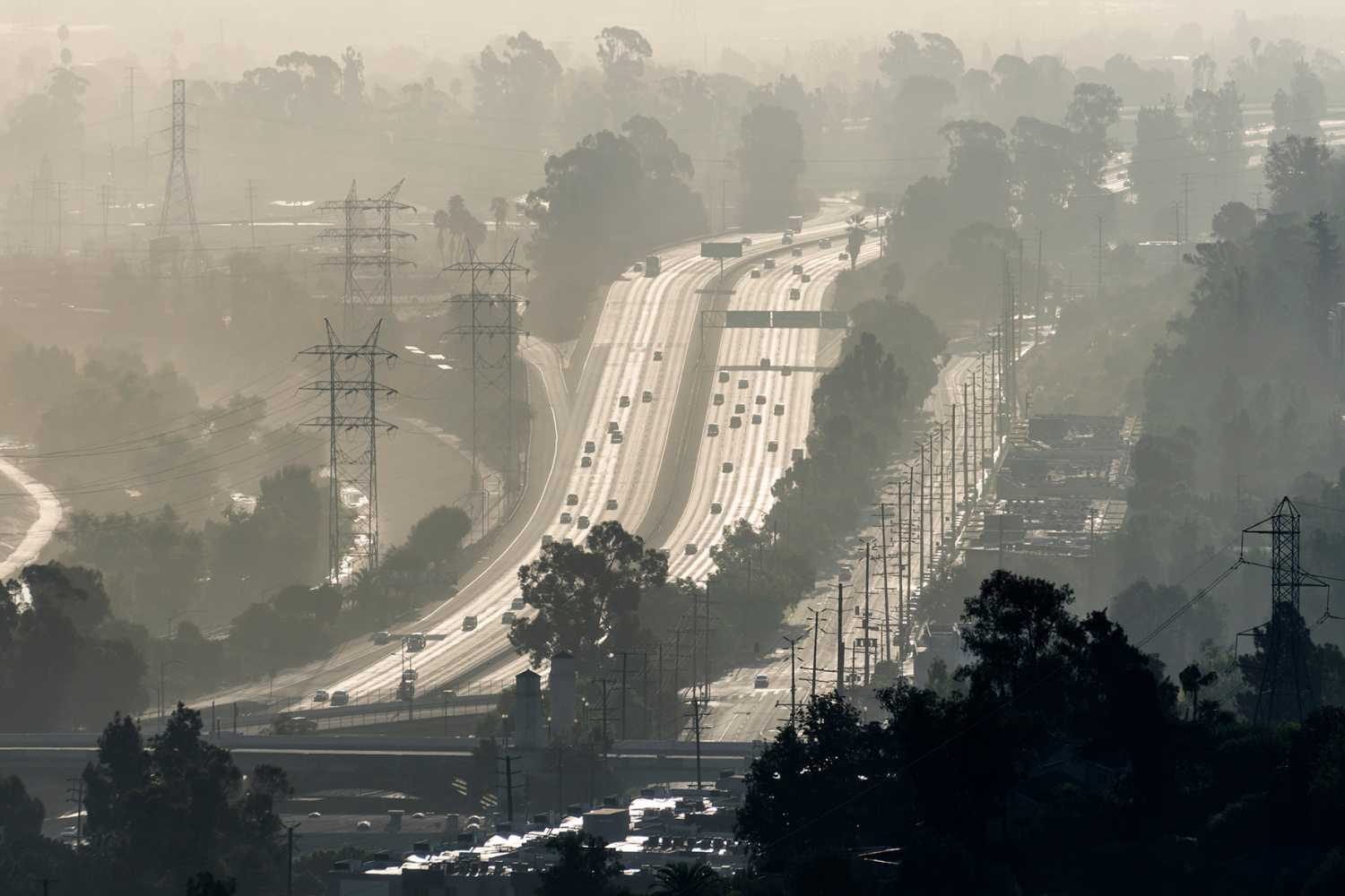 Hazy smoggy view of the 5 freeway near Riverside Drive, Griffith Park and the Los Angeles River in Southern California.